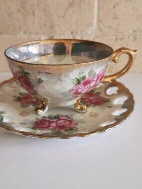 Iridescent Footed Teacup with Pink Roses and Blue Trim Cutouts Saucer Vintage